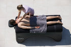Therapist treating an athlete on a Nubis portable table